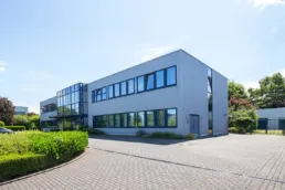 Bürohaus Baesweiler Blau PHI Commercial Referenz